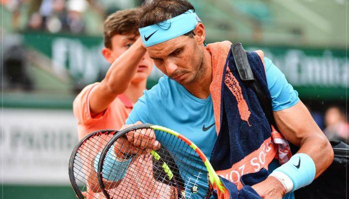  Rafael Nadal trailing Diego Schwartzman as rain intervenes