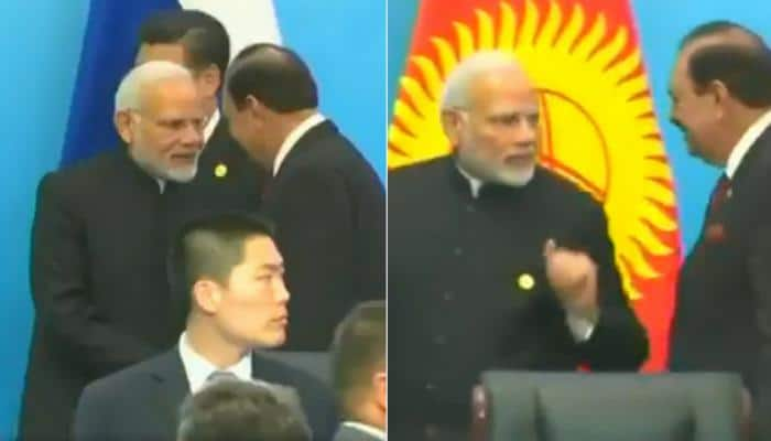 After handshake with Pakistan President Mamnoon Hussain, PM Narendra Modi talks tough on terror and Afghanistan