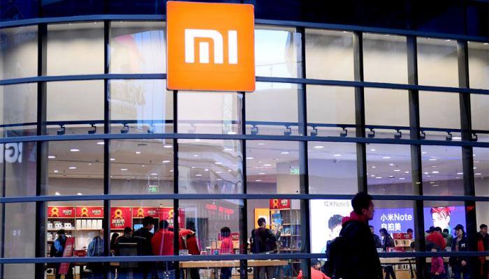 Xiaomi logs $1 billion first-quarter loss but record overseas revenue ahead of IPO