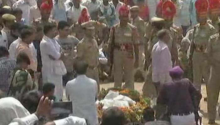 Deal firmly with Pakistan: BSF martyr&#039;s father to Indian government during last rites of son