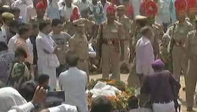 Deal firmly with Pakistan: BSF martyr's father to Indian government during last rites of son