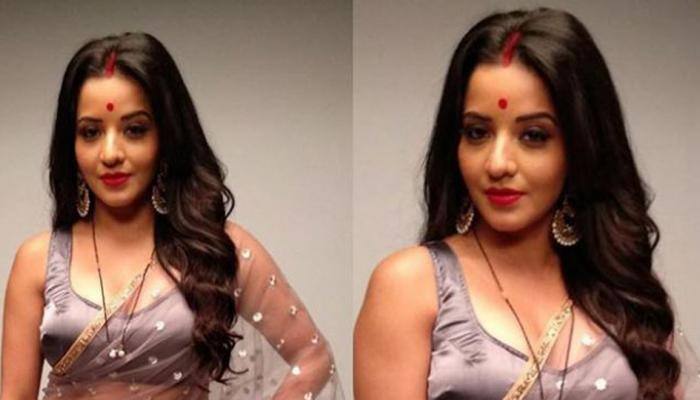 Bhojpuri actress Monalisa aka Jhuma Boudi sizzles in a sheer saree 