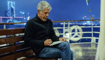 Artist honours Anthony Bourdain with lifelike murals
