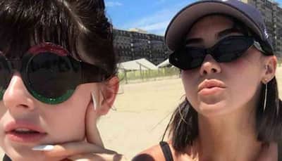 Lauren Gottlieb sets temperature high in black bikini on beach — See pics
