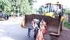 Forget the traditional 'Doli', a man takes wife home on a JCB vehicle post-wedding—See viral pics