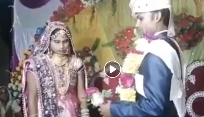 Groom &#039;throws&#039; garland around bride&#039;s neck in the most hilarious way—Watch