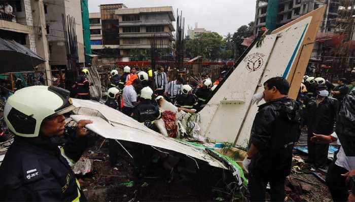 Heard loud explosion, saw burning body, witnesses recall Mumbai plane crash
