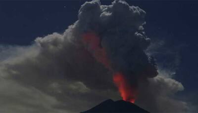 Bali shuts international airport after volcanic eruption, thick smoke and ash seen billowing