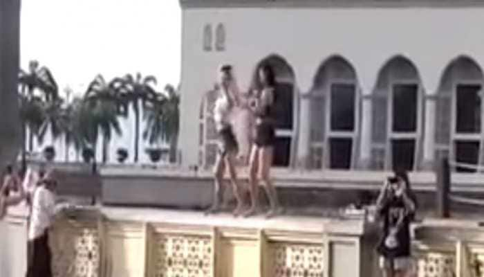 Malaysia throws out Chinese women tourists for dancing outside mosque