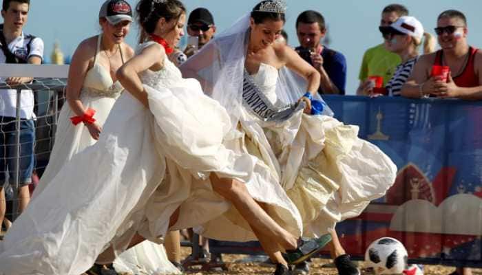 &#039;Not only a man&#039;s game&#039;: Russian women play soccer wearing bridal dresses, running shoes - In pics