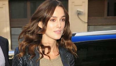 Keira Knightley shows off her washboard abs while holidaying