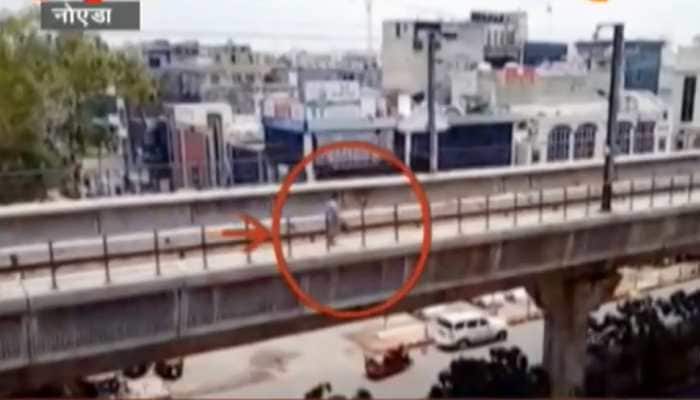 Woman walks on Delhi metro track in an alleged bid to commit suicide - Watch viral video