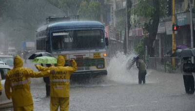 Mumbai rain continues to affect city, local trains running late: Live updates