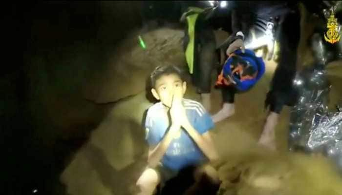 Soldiers to stay with Thai children trapped in cave as rescue may take months