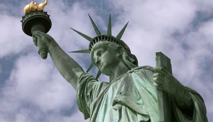 Woman climbs Statue of Liberty after stand-off, forced evacuation