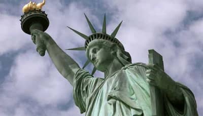Woman climbs Statue of Liberty after stand-off, forced evacuation