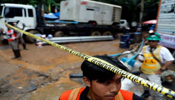 Rescuers fear more rain could hamper efforts to save 12 boys trapped in Thai cave