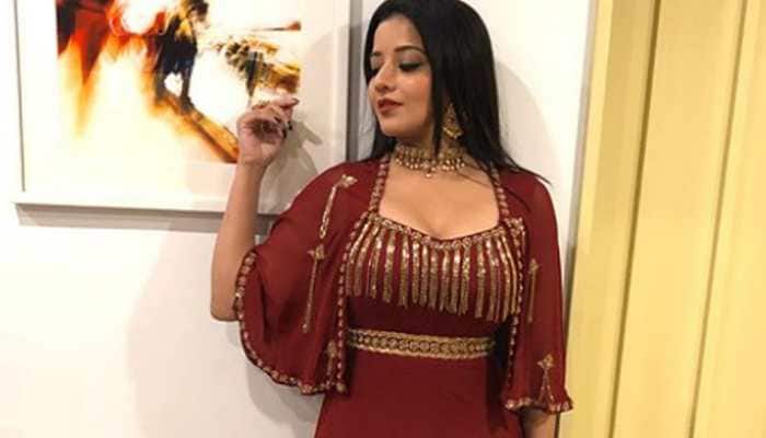  Bhojpuri hottie Monalisa sets the stage on fire with her scintillating performance in fiery red ensemble