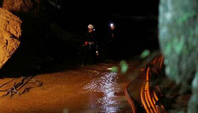 Rains hit Thai cave where rescuers face ‘war with water and time’ to save children