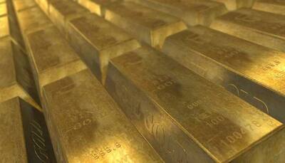 Gold prices rise as dollar slips to weakest since mid-June