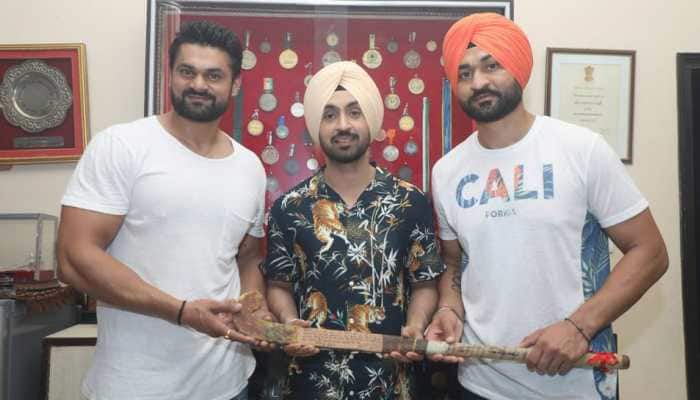 Diljit Dosanjh visits real &#039;Soorma&#039; Sandeep Singh in his hometown, gets hockey as a gift—See pics