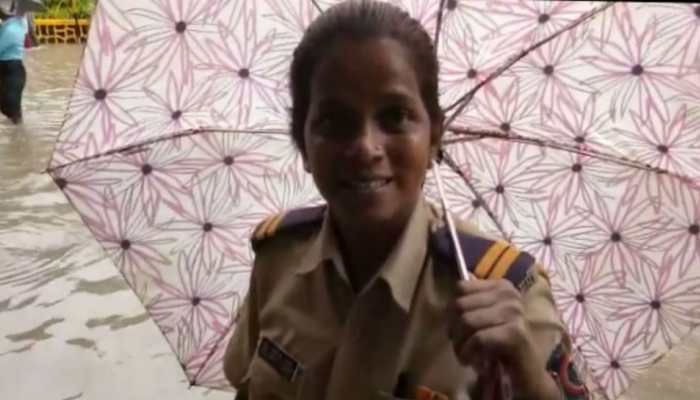 Mumbai's woman constable braves knee-deep rain water to help people