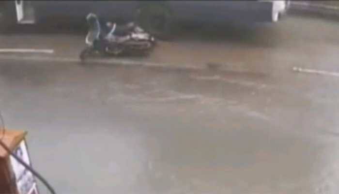 Woman crushed to death after falling off bike on water-logged Mumbai road