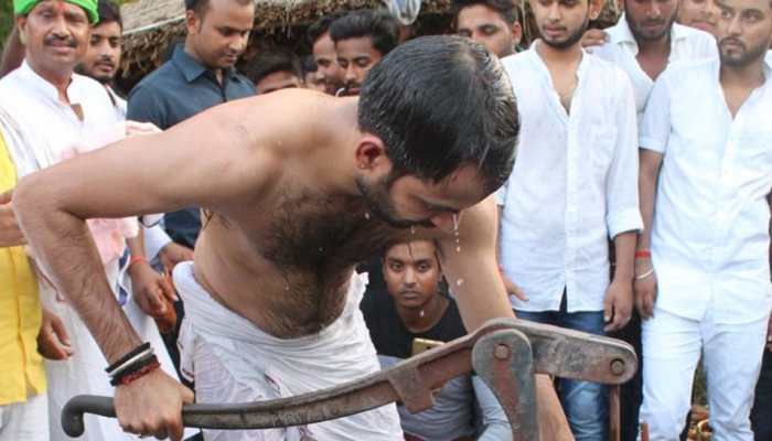 In pics: Tej Pratap Yadav takes a bath at Dalit’s home in Mahua