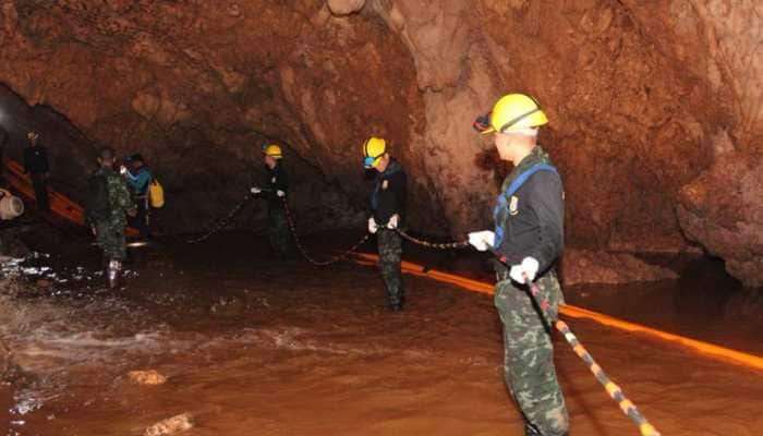 All 12 boys and football coach rescued from Thai cave