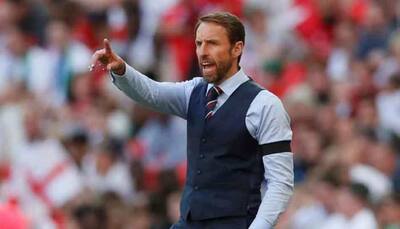 #WaistcoatWednesday: England fans suit up ahead of FIFA World Cup 2018 semifinal