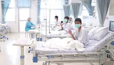 Watch: Staff gets emotional as rescued Thai Boys wave and smile from hospital beds