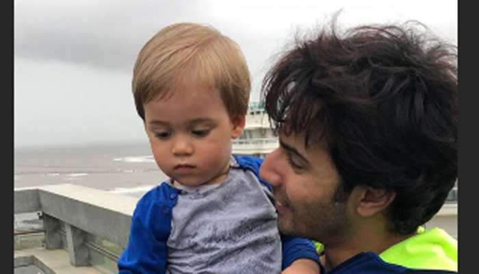 Karan Johar shares adorable picture of son Yash with Varun Dhawan
