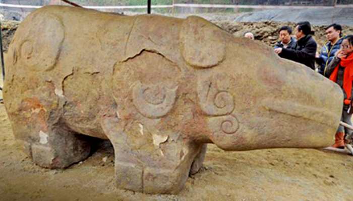 Residents of Chinese city demand return of ancient rhino statue, blame its relocation for floods