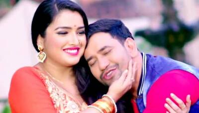 Bhojpuri sizzler Amrapali Dubey can't contain her happiness as she receives Dinesh Lal Yadav Nirahua at the airport-Watch 
