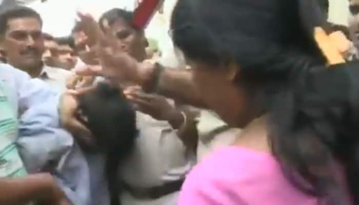 Watch: Man who held a model hostage in Bhopal beaten up by women