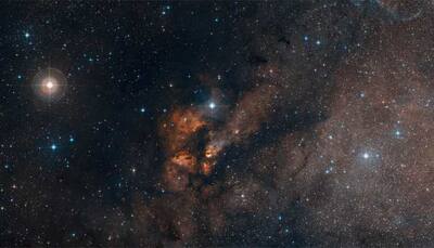 Dust-shrouded stellar cluster, with hundreds of young, hot and massive stars spotted- In pics