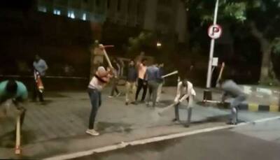 To protest against potholes in Mumbai, MNS workers break road in front of Mantralaya