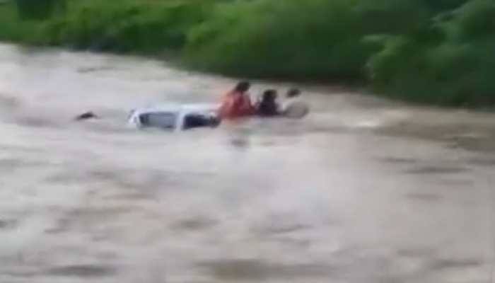 WATCH: Dramatic footage shows family, trapped in submerged car, rescued in Navi Mumbai&#039;s Taloja