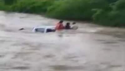 WATCH: Dramatic footage shows family, trapped in submerged car, rescued in Navi Mumbai's Taloja