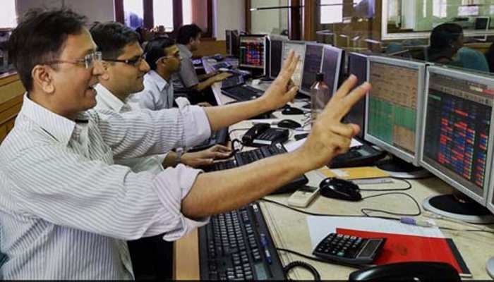 Sensex hits fresh record high on firm global cues