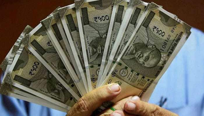 Rupee slips 43 paisa to end at life-time low of 69.05 against dollar