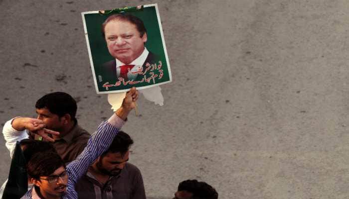 Inmates jeer as Nawaz Sharif takes stroll in prison premises