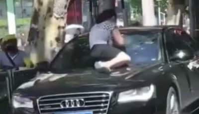 Wife smashes husband's Audi after catching him with mistress