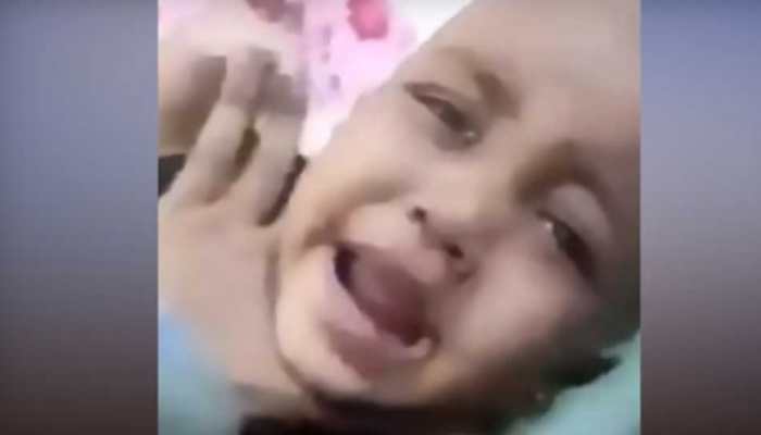 Saudi Arabian mother who was caught on camera beating her twins for money arrested 