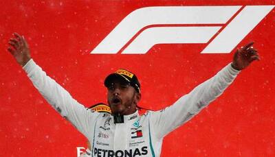 Hamilton reprimanded but keeps German GP win