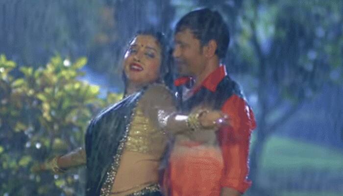 Amrapali Dubey-Dinesh Lal Yadav Nirahua&#039;s sizzling rain dance in Karela Man Pat Jayi goes viral - Watch