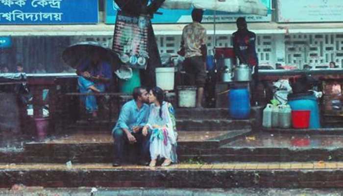 Bangladeshi photographer thrashed, fired from job for clicking young lovers kissing in rain  