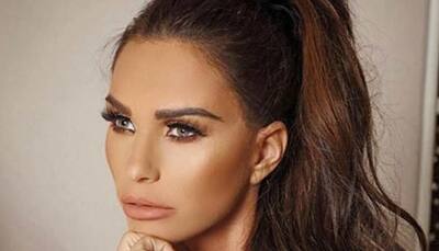 Katie Price reports herself to police