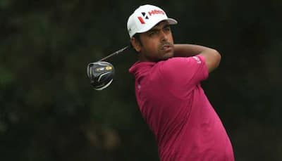 Indian golfer Anirban Lahiri tied 7th after flying start, Tiger Woods 14th at World Golf Championships