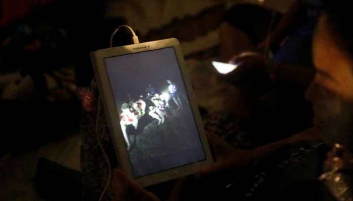 Thai cave boys leave Buddhist monastery after honouring dead rescuer